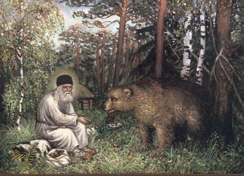 Lienzo del Santo alimentando a un oso.