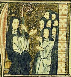 anta Hildegarda instruyendo a las monjas de su Abadía. Es la 4ª doctora de la Iglesia y la 6ª. de origen benedictino.