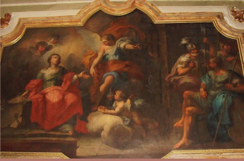 La Santa en la cárcel, alimentada con pan y vino por ángeles. Pintura de Gaspare Serenario en la Capilla de la Santa. Iglesia de San Francisco de Paula, Palermo (Italia).