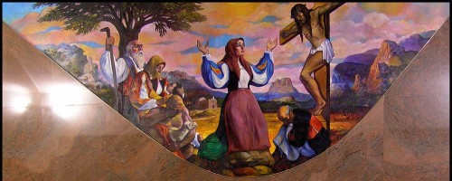 Mural contemporáneo de la Beata en adoración ante Jesús Crucificado. Parroquia de Orgosolo, Cerdeña.