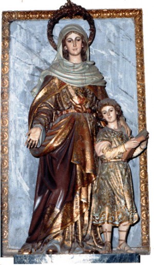 Imagen de la Santa con su hijo Agustín, todavía niño. Iglesia del Salvador y de Santa Mónica, Valencia (España).