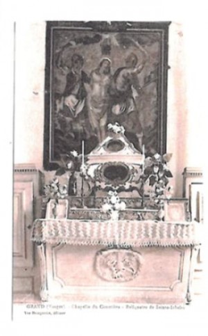 Lienzo con la flagelación de la Santa y la urna de sus reliquias. Iglesia de la Santa en Grand, Francia.
