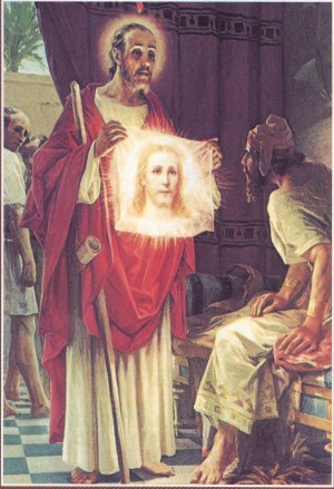 El Santo mostrando la imagen de Cristo. Estampa devocional.