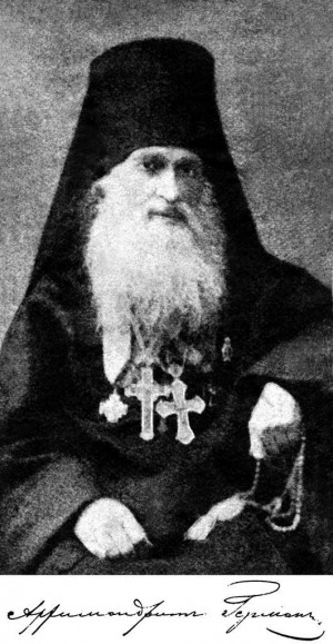 Fotografía y firma del santo.