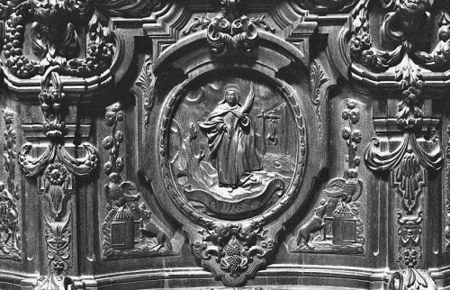 Detalle de Santa Digna en la sillería del coro de la catedral de Córdoba, España.